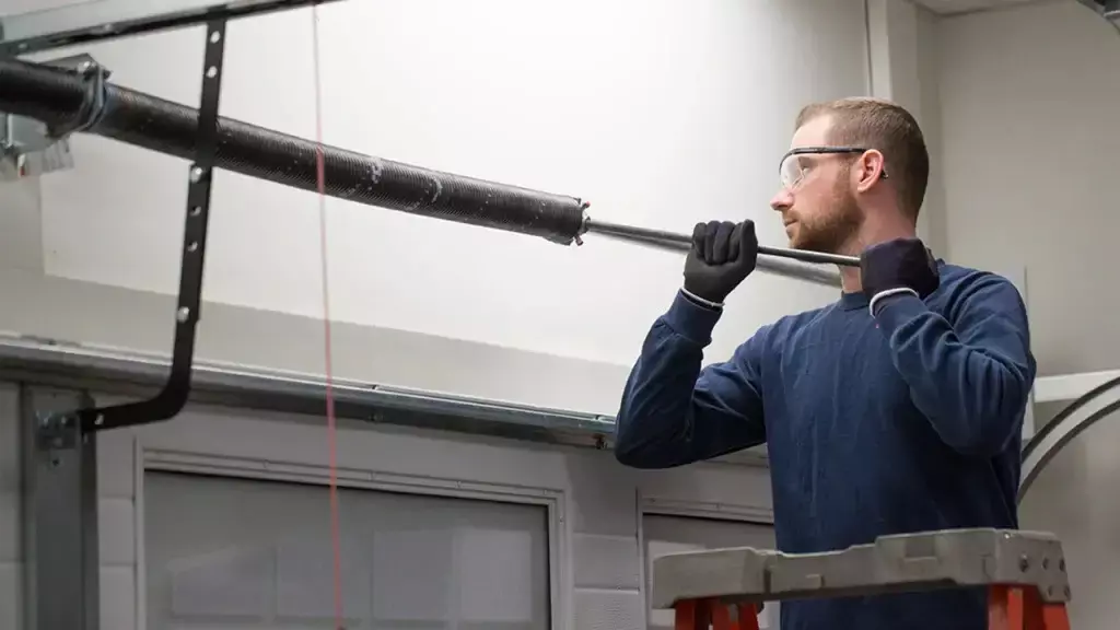 What to Do When Your Garage Door Torsion Spring Breaks